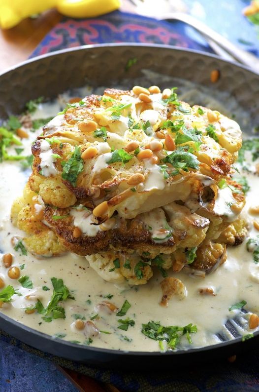 ROASTED CAULIFLOWER STEAKS WITH TAHINI SAUCE
